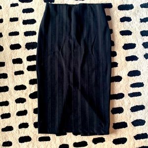 Long length, elastic pencil skirt with black stripes
